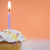 Photo of cupcake with one candle